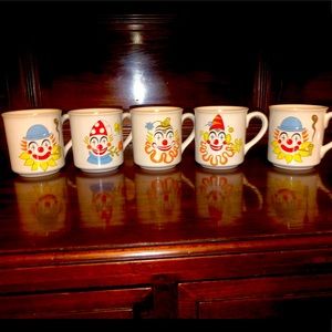 A set of 5 vintage clown coffee mugs